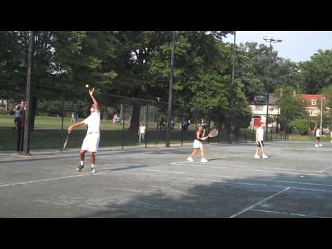 Ivo Karlovic and Jo-Wilfried Tsonga playing with l...