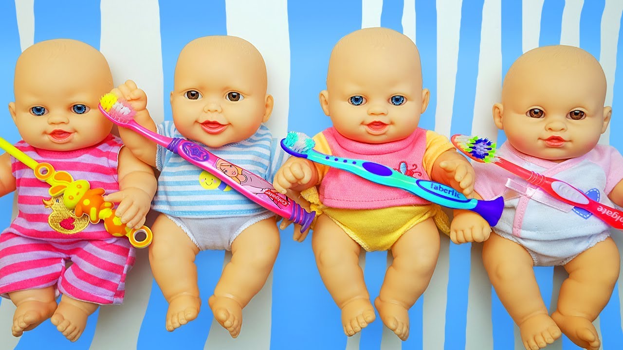 Girl taking care of toy babies YouTube