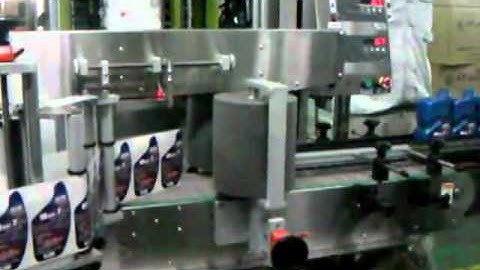 Labeling LD-300 Front-and-Back Labeler for Lubricant.avi