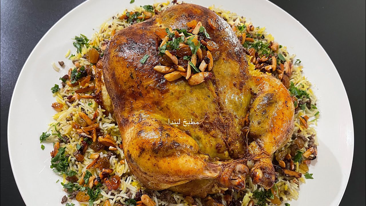 الدجاجة المحشية بالرز واللحمه على طريقتي