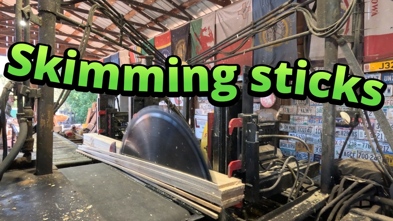Sawing spruce skimming sticks # 929