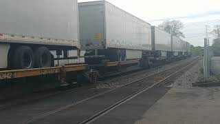NS 241 UPS trailer train heading to Gest Street Yard is in Carthage at City Centre Dr heading West
