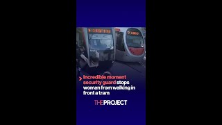 Incredible Moment Security Guard Stops Woman From Walking In Front A Tram