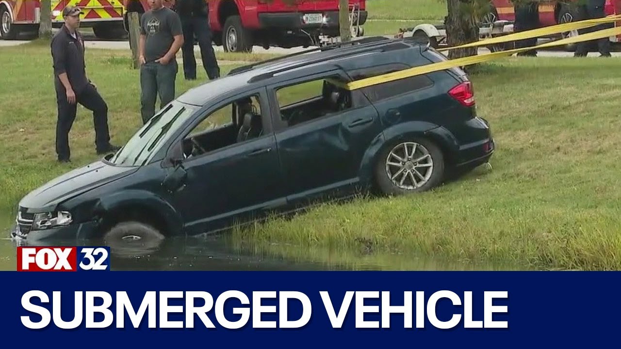 Man, 64, dead after vehicle found submerged in south suburban retention ...