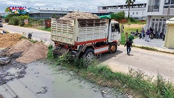 NICELY START PROJECT LANDFILL BY EXPERT DRIVER 5T TUCKS UNLOADING SOIL & DOZER KOMATSU D31P PUSHING