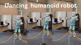 Kawasaki's 'RHP friends' humanoid robot  dancing and signing