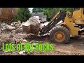 Building a retain wall using natural stone with Volvo excavator quite the puzzle #awesome