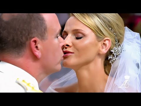 youtube.com MONACO - Prince Albert of Monaco and his bride Charlene Wittstock continued the Royal Wedding celebrations Saturday, July 2, 2011 with a religious ceremony, one day after they were officially wed in a civil ceremony - FashionTV brings you the exclusive! Charlene wore an off-the-shoulder Giorgio Armani gown paired with a long long veil for the Catholic ceremony, which was held in the throne room at the princely palace. Celebs Attending: Giorgio Armani, Karl Lagerfeld, Jean Michelle Jarre, Bernadette Chirac, Roger Moore, Karolina Kurkova, Nicolas Sarkozy, Nadia Comaneci, Renee Fleming, Alain Ducasse, Princesses Caroline and Stephanie of Monaco See more @ facebook.com FTV.com