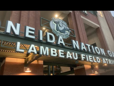 Manchester Bayern soccer fans on their feet after lightning storm at Lambeau Field Green Bay