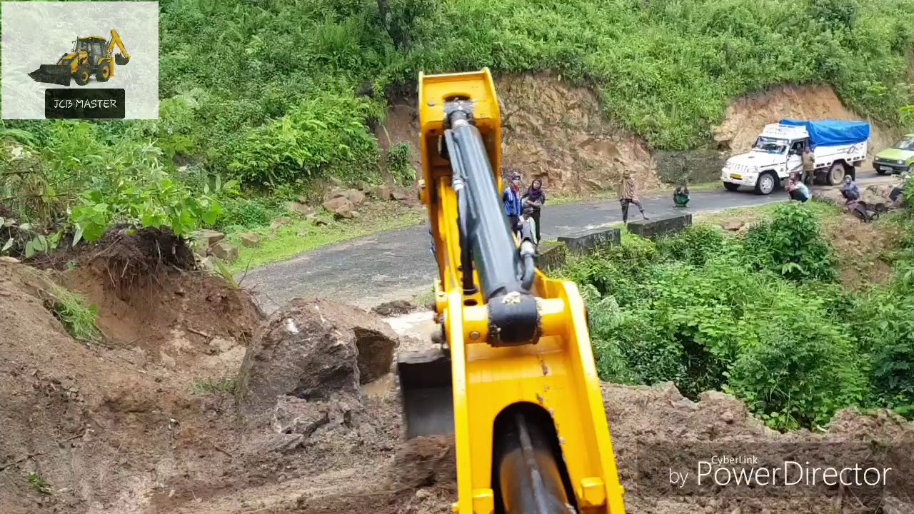 Jcb removing rock that block the road - jcb videos