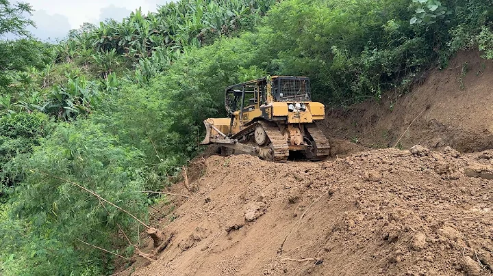 Opening a Difficult Path in the Mountain with a D6R XL Bulldozer