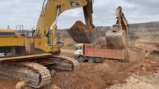 Two Caterpillar 365C Excavators Loading Mercedes & MAN Trucks With Three Passes