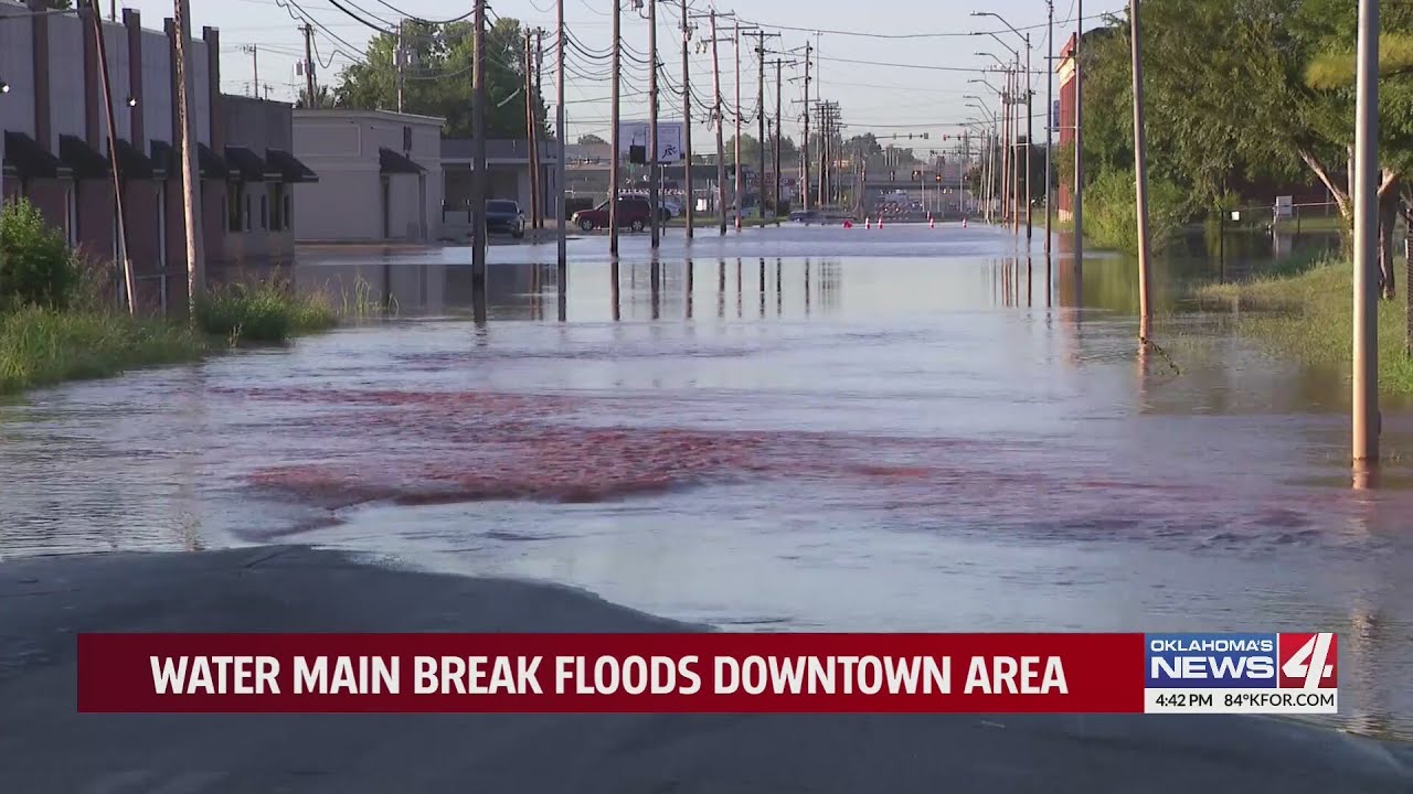 Water main break floods downtown area - YouTube