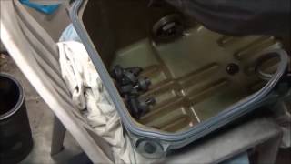 Detroit series 60 in frame rebuild (part 13) install oil pan and exhaust manifold