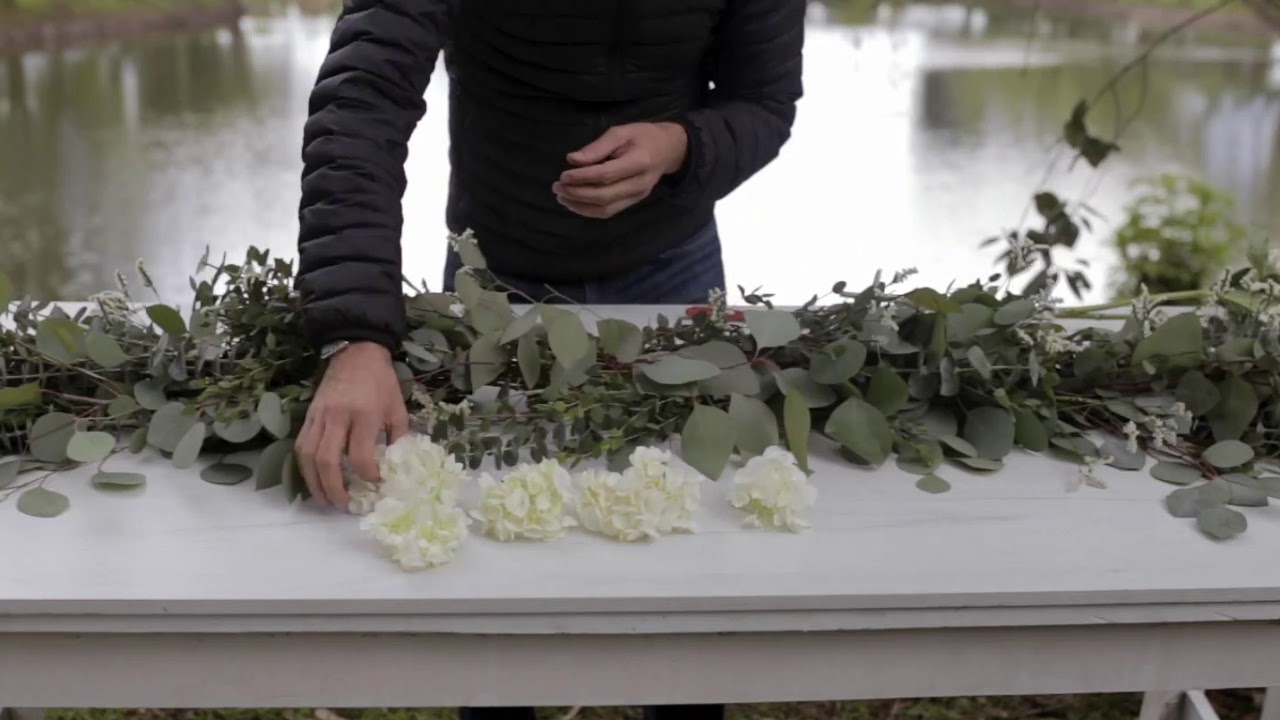 How to style a moody mantelscape with a dramatic DIY baby's breath garland