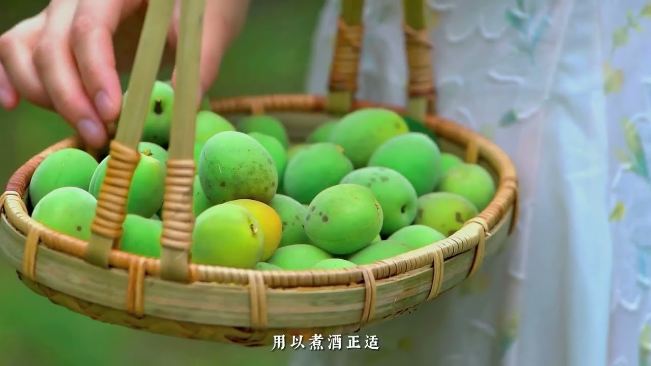 The poetic charm of midsummer lies within a glass of green plum wine