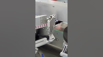 Auto bottle cap labeling machine/Label applicator for cap/Sticker labeling machine
