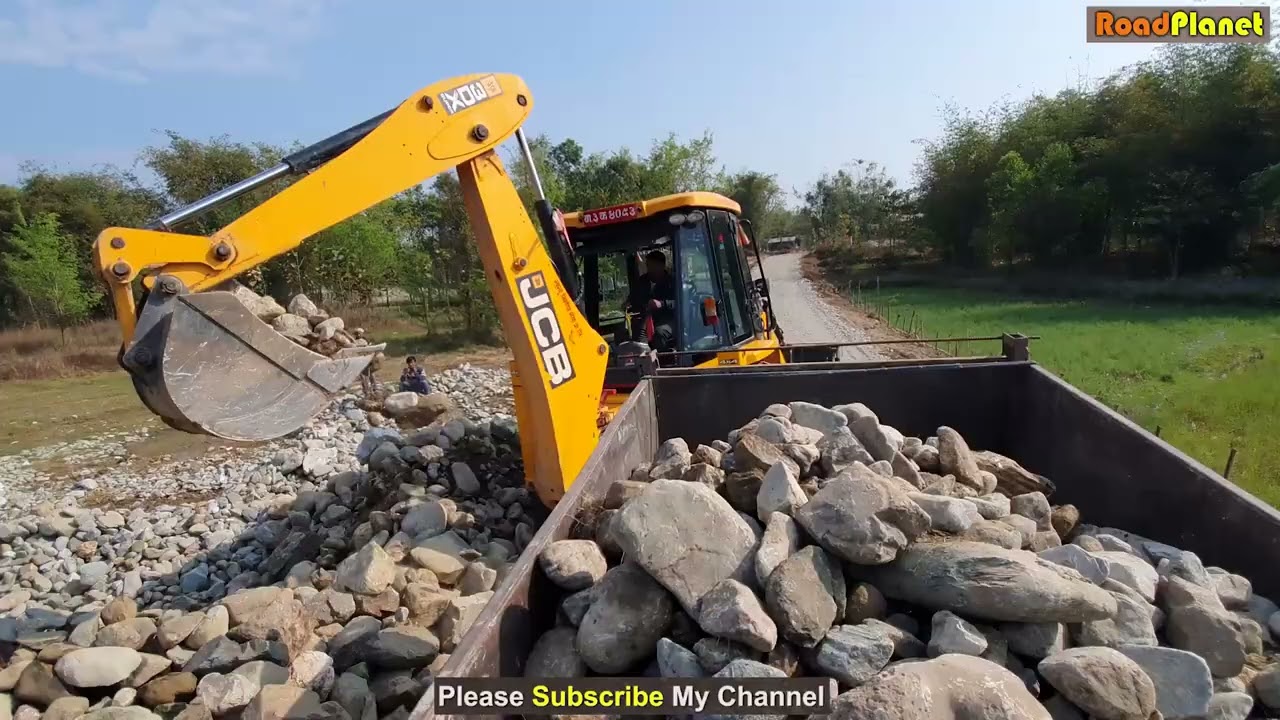 JCB Backhoe Loader Loading Stone in Tractor   JCB Machine Working