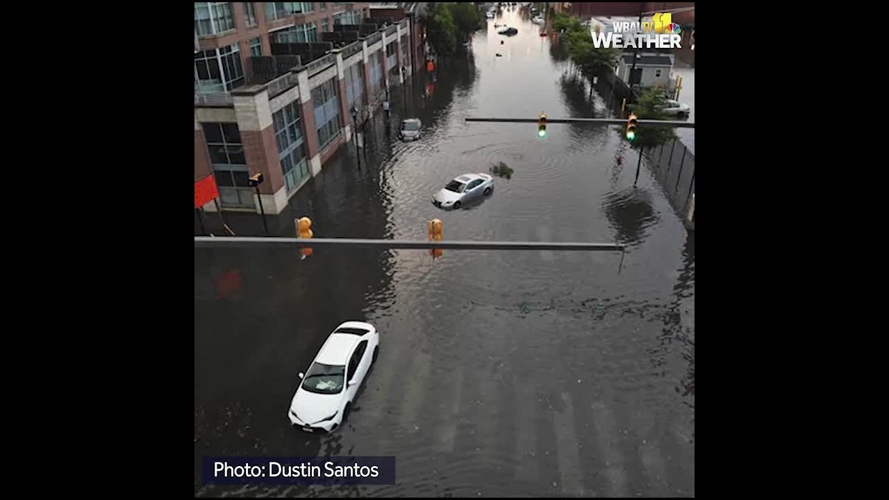 Slow-moving heavy rain floods Baltimore - YouTube