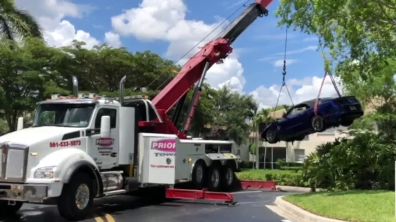 vero beach weather Palm Beach County firefighter rescues woman, dog after car crashes into Wellington lake