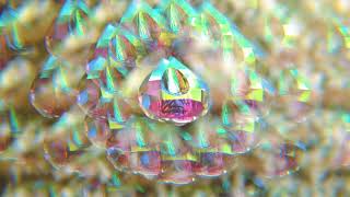 [FREE STOCK VIDEO] Kaleido effect trippy visuals of a multi-coloured crystal satisfying slow motion