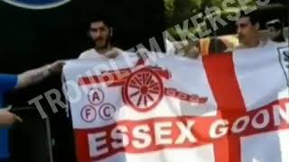 Qarabag fans ask for a photo with an Arsenal flag, then run away