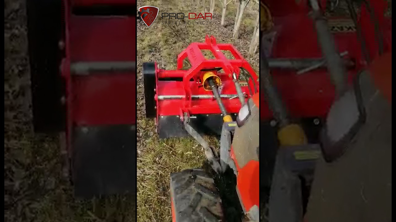 Kosiarka bijakowa  w sadzie PRO-DAR KB170. Traktor Kubota  M7040