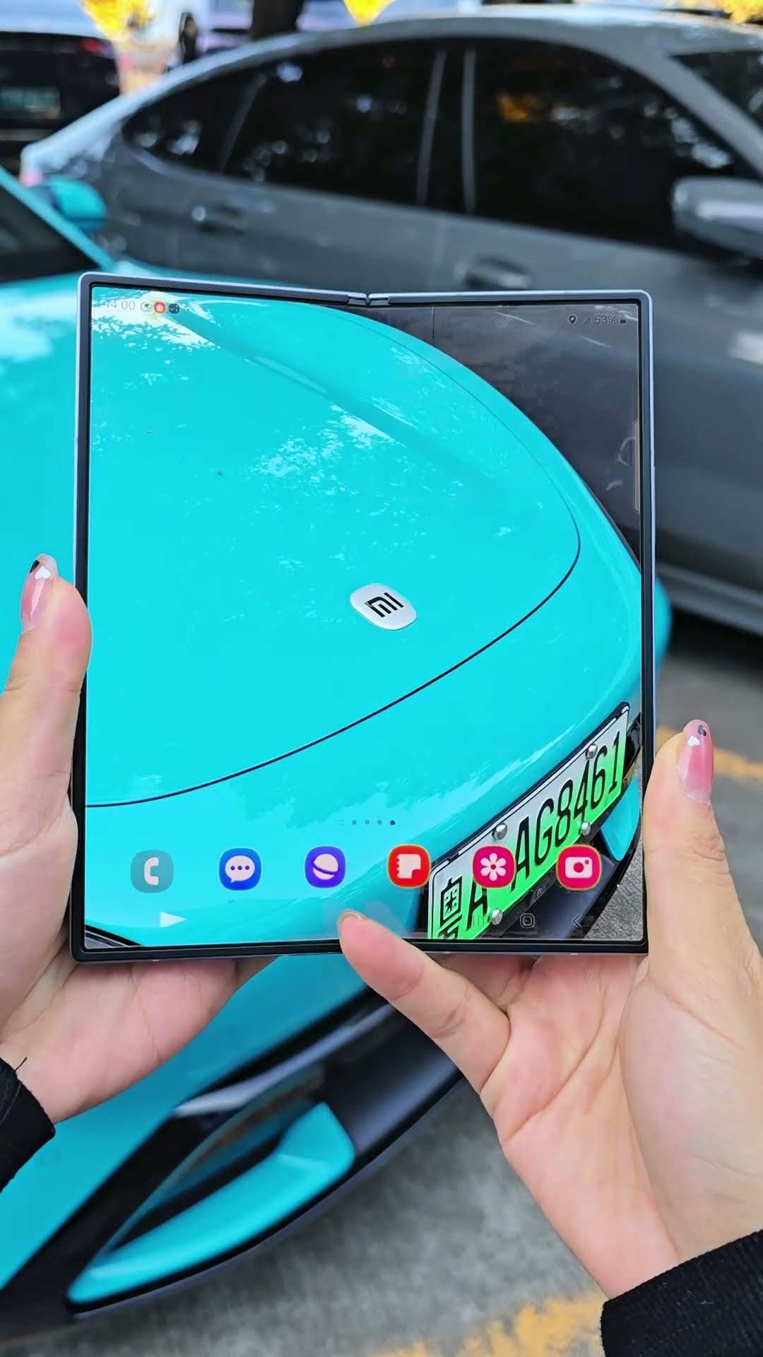 How amazing is the Samsung Fold6 taking photos of Xiaomi su7 #Mobile phone numberCode #shorts