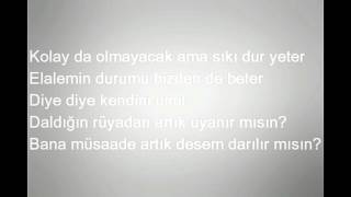 Hande Yener Ft. Serdar Ortaç - İki Deli Lyrics Resimi