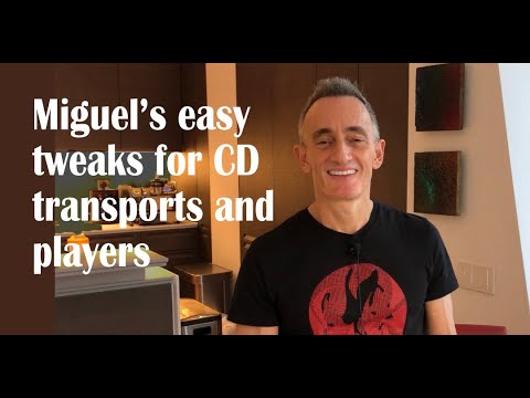 Miguel pops the lid on his CD transport to tweak the sound Miguel pops the lid on his CD transport to tweak the sound