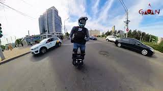 Leaprkim Patton unicycle and motorcycle in traffic jam