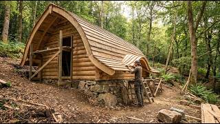 Information From a Bare Timber Frame to a Curved Roof Forest Cabin on a Woodland Slope News