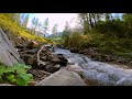 Taking a break by a rushing mountain stream