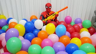 Spider Man Nerf Gun Popping Balloons! (spider-man in real life)