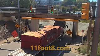 Semi truck loses stacks at the 11foot8+8 bridge