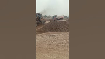 Sub base top leveling with grader