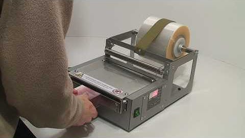 QUALITY: Delta200, manual overwrapping machine. (Perfume boxes overwrapping, box #1)