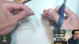 S2E1B2 - Fix the Arduino wood robot arm where screws go through the wood pieces with plastic wrap