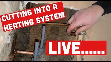 PLUMBING TRICK- CUTTING INTO LIVE CENTRAL HEATING PIPES to fit RADIATOR without draining the system