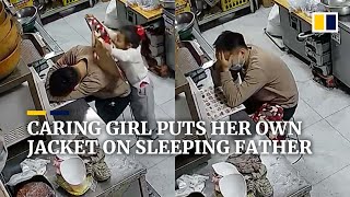 Chinese father bursts into tears after daughter places jacket on him