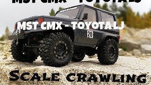MST CMX - Loops Model Toyota LJ scale rock crawling on stone quarry