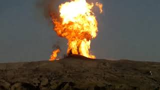 Mud volcano explosion with fireball