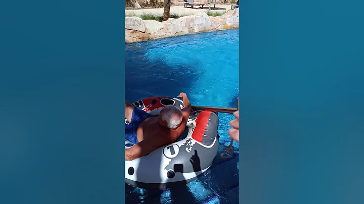 Husband's showing their wives how to get in a tube!