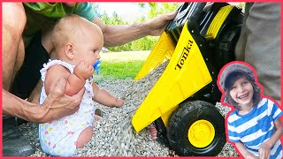 Toy Dump Truck and Loaders Play at the Park