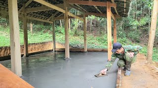 Leveling - Pouring concrete on a wooden kitchen floor in the forest