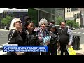 Cook County Treasurer Maria Pappas hands out flowers for Mother&#39;s Day