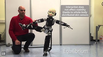 iCub balancing on one foot while interacting with humans