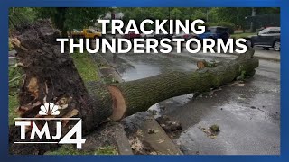 Severe weather floods streets, takes down trees