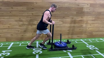 Sled push (glute focus)