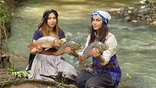 Steamed carp fish flavored with organic pomegranates and spices in the beautiful village